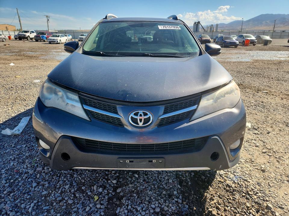 Снимка 5 от търг – 2014 TOYOTA RAV4 с VIN JTMRFREVXED084651