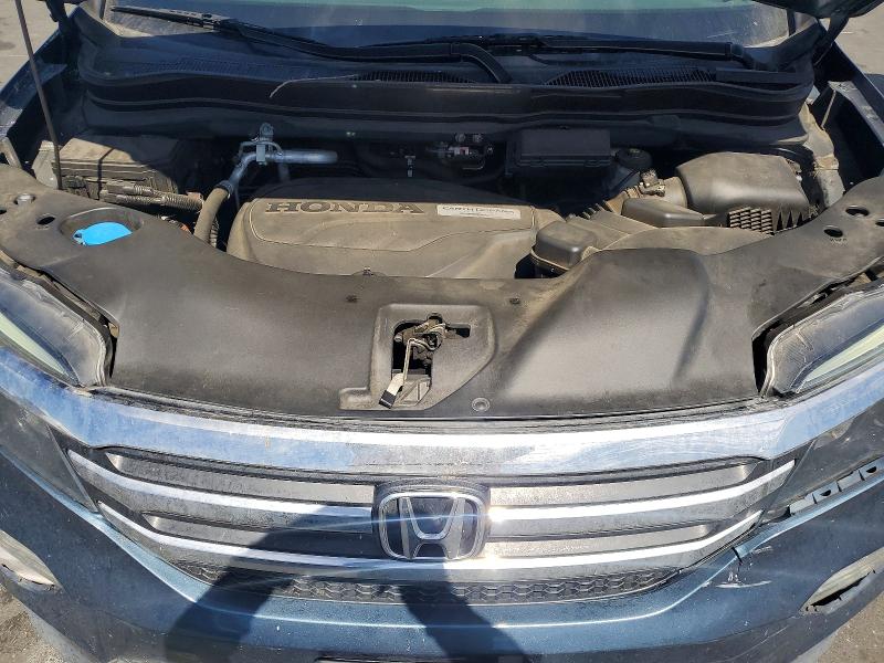 Photo 11 from auction – 2018 HONDA PILOT with VIN 5FNYF6H55JB007081