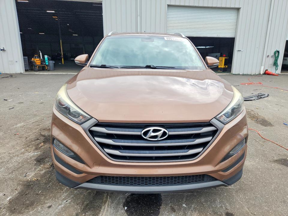 Photo 5 from auction – 2016 HYUNDAI TUCSON with VIN KM8J33A22GU076704