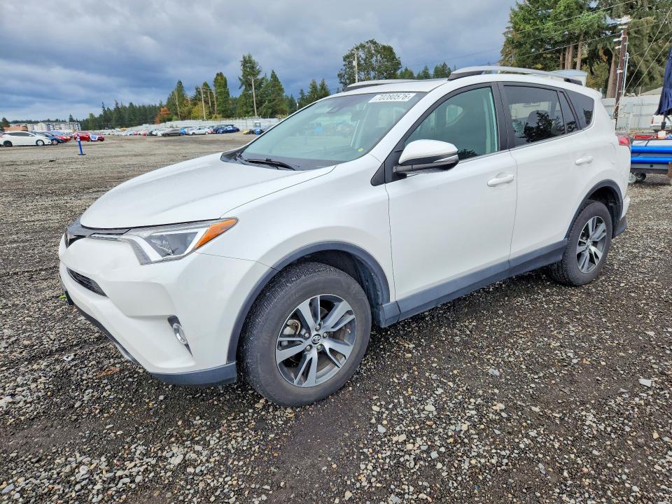 TOYOTA RAV4 2018 with VIN 2T3RFREV3JW801050 - Photo from auction