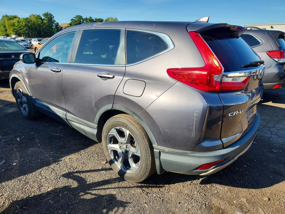Photo 2 from auction – 2017 HONDA CR-V with VIN 2HKRW2H57HH675747