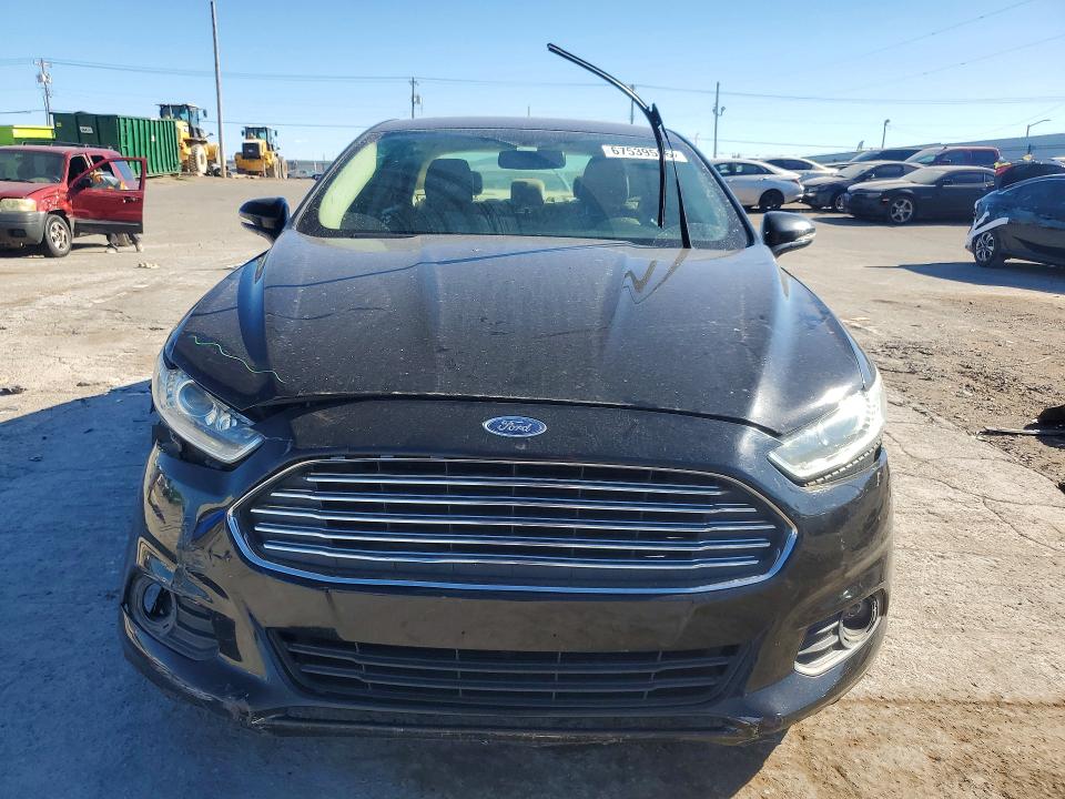 Photo 5 from auction – 2016 FORD FUSION with VIN 3FA6P0HD3GR113521