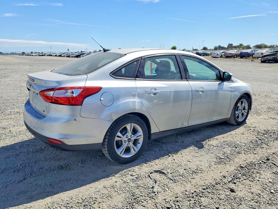 Снимка 3 от търг – 2014 FORD FOCUS с VIN 1FADP3F25EL327500