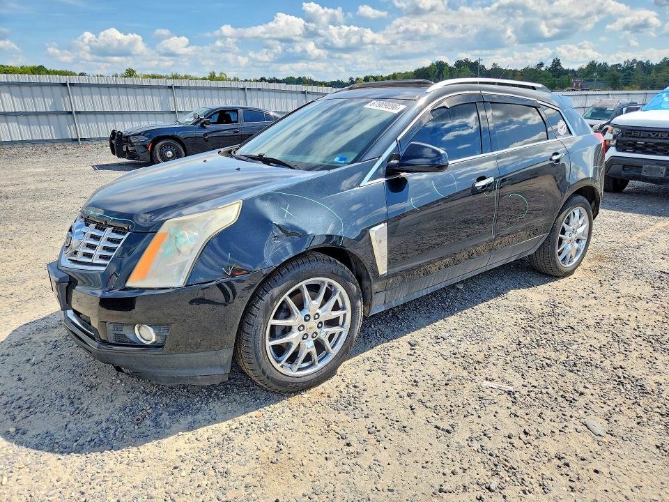CADILLAC SRX 2014 with VIN 3GYFNFE37ES572498 - Photo from auction