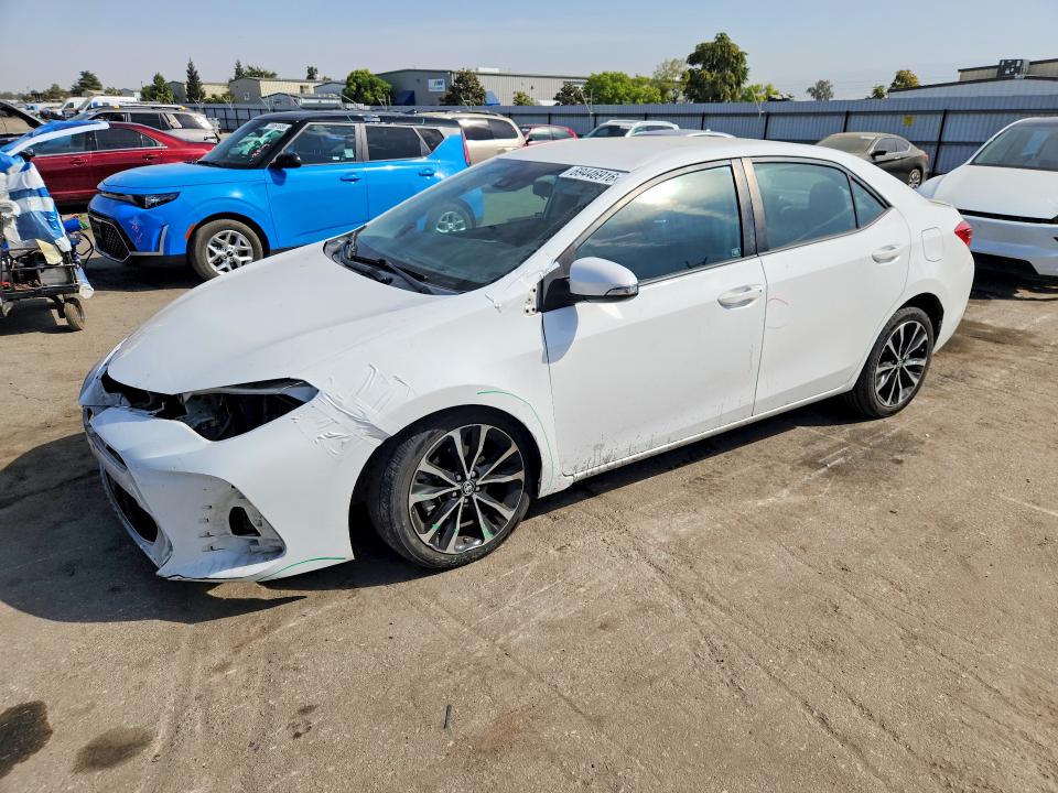 TOYOTA COROLLA 2017 with VIN 5YFBURHEXHP696417 - Photo from auction