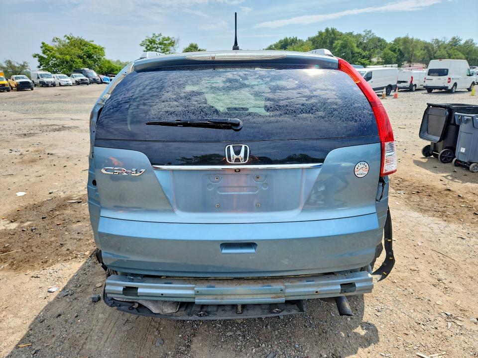 Photo 6 from auction – 2014 HONDA CR-V with VIN 2HKRM3H5XEH509066