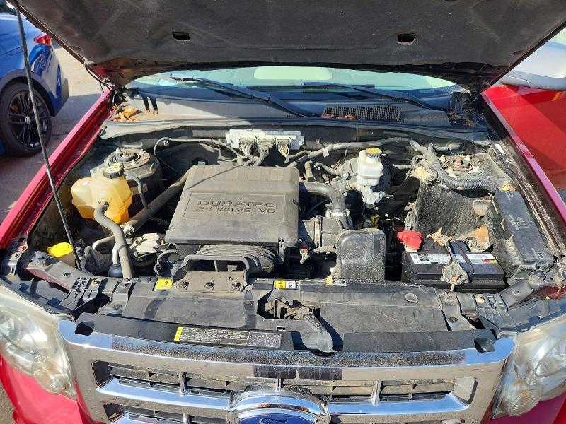 Photo 12 from auction – 2009 FORD ESCAPE with VIN 1FMCU93G19KA16591