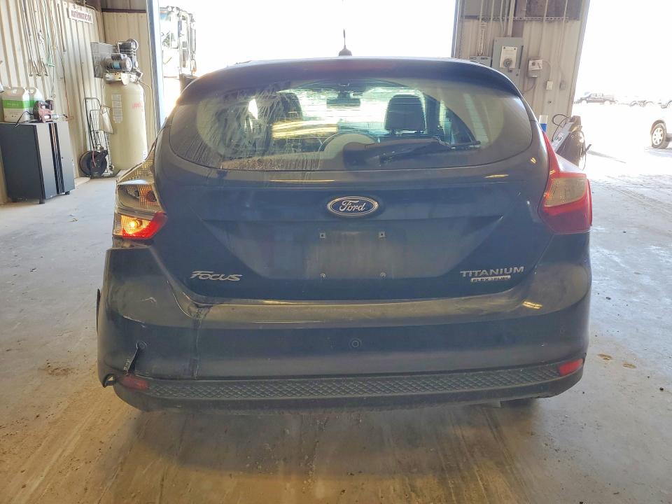 Photo 6 from auction – 2012 FORD FOCUS with VIN 1FAHP3N20CL449438