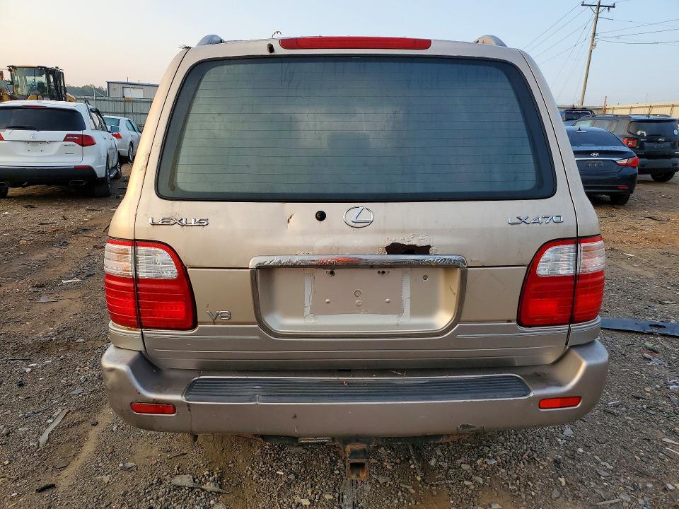 Photo 6 from auction – 1999 LEXUS LX with VIN JT6HT00W2X0025661