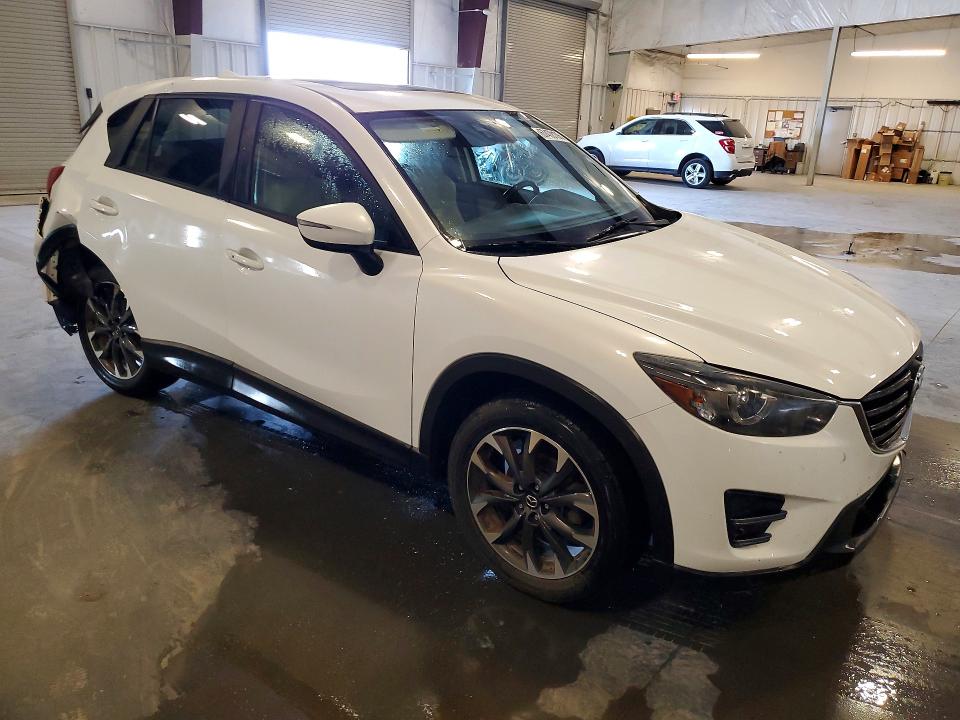 Фото 4 с аукциона – 2016 MAZDA CX-5 с VIN JM3KE4DY7G0703999