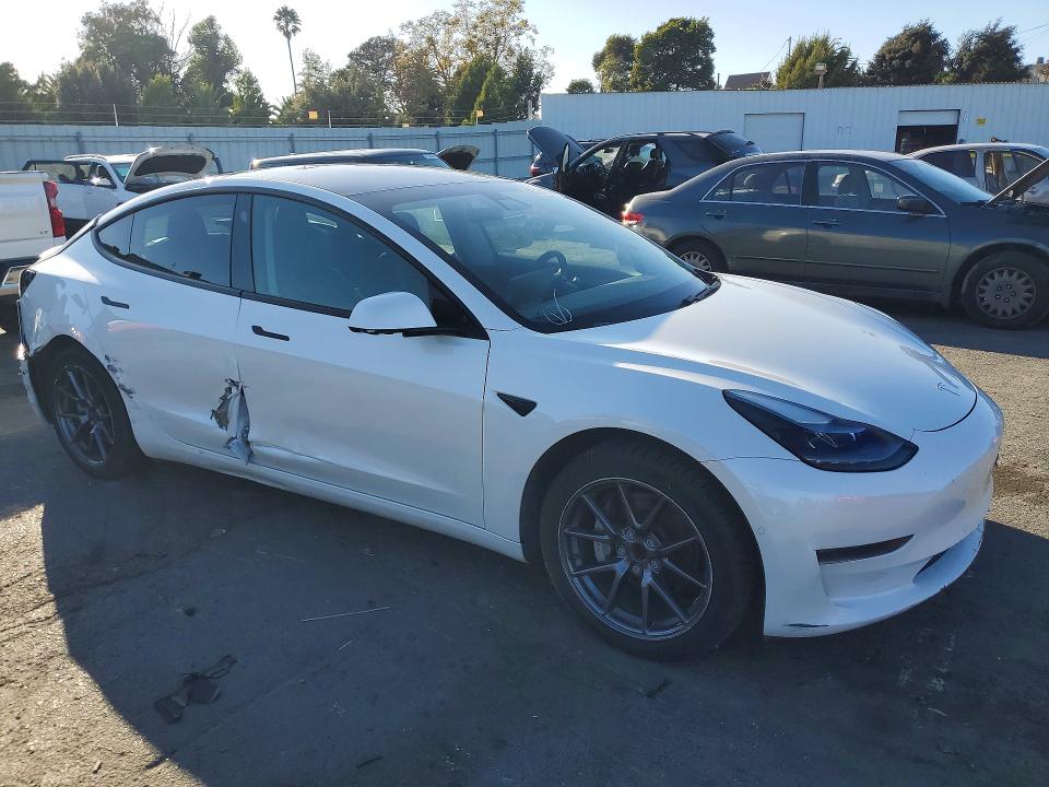 Photo 4 from auction – 2021 TESLA MODEL 3 with VIN 5YJ3E1EA2MF051643