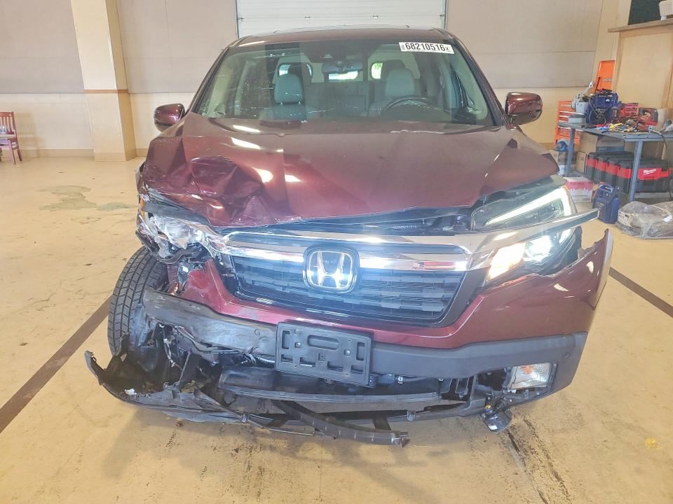 Photo 5 from auction – 2019 HONDA RIDGELINE with VIN 5FPYK3F70KB011756