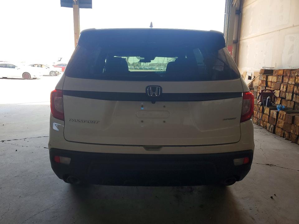 Photo 6 from auction – 2021 HONDA PASSPORT with VIN 5FNYF7H26MB004626