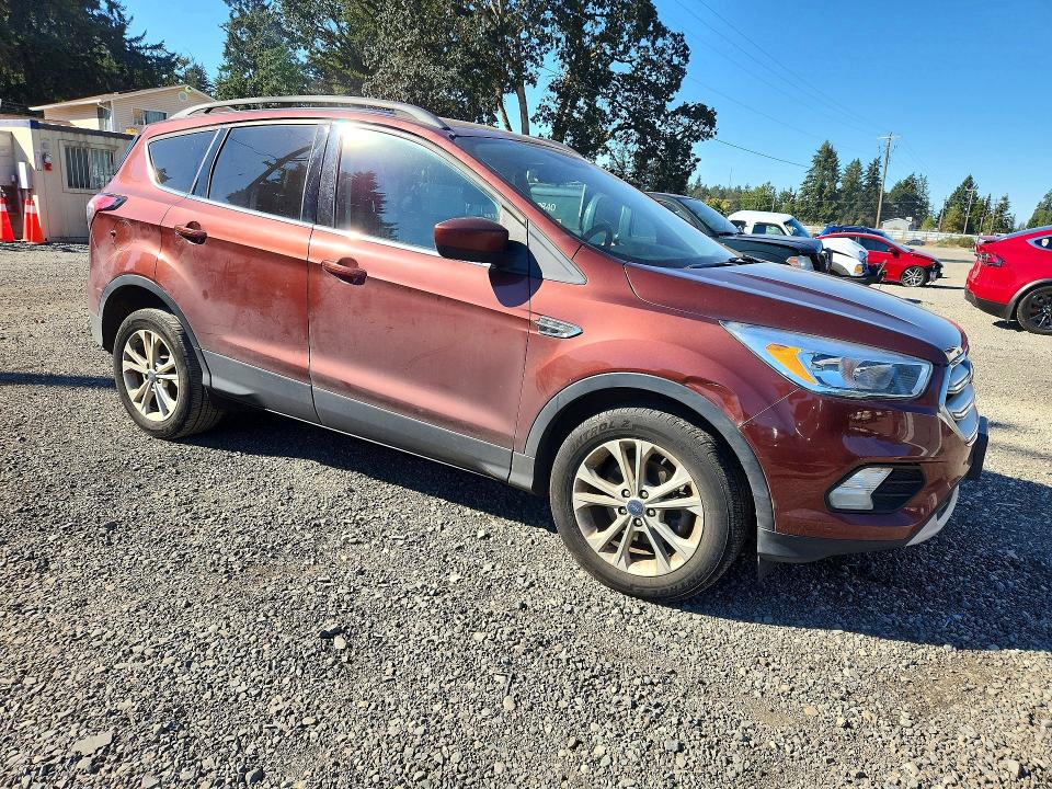 Photo 4 from auction – 2018 FORD ESCAPE with VIN 1FMCU0GD8JUB62331