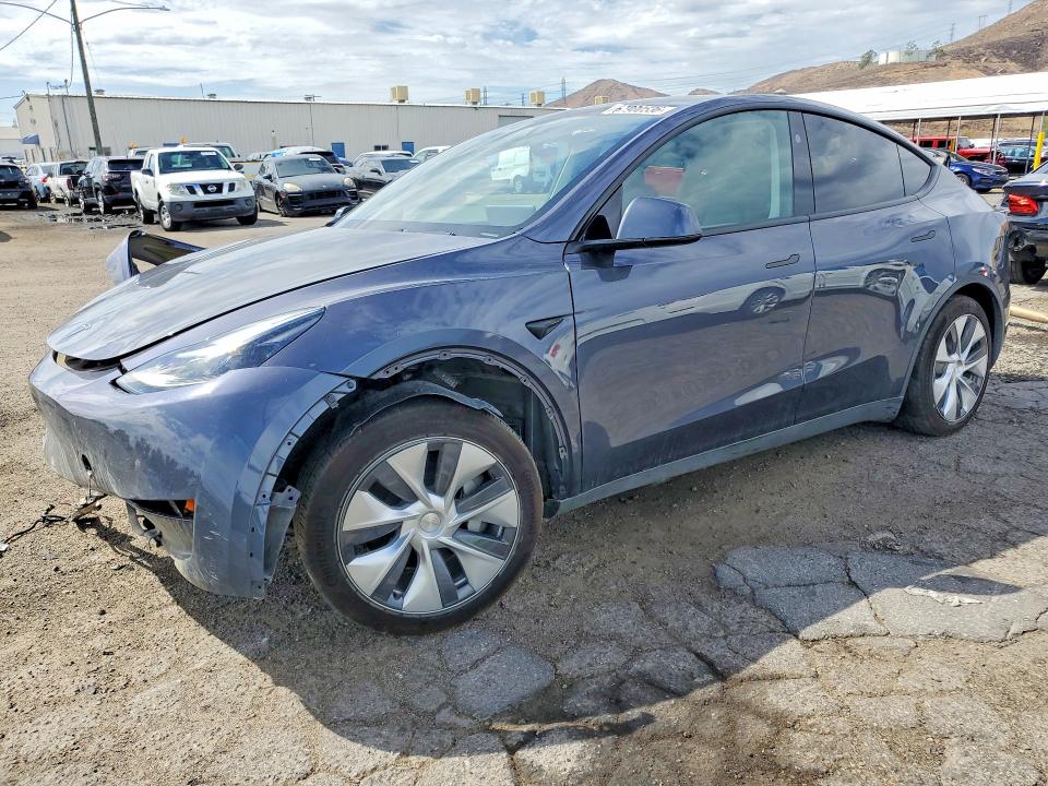 TESLA MODEL Y 2023 with VIN 7SAYGDED6PF960505 - Photo from auction