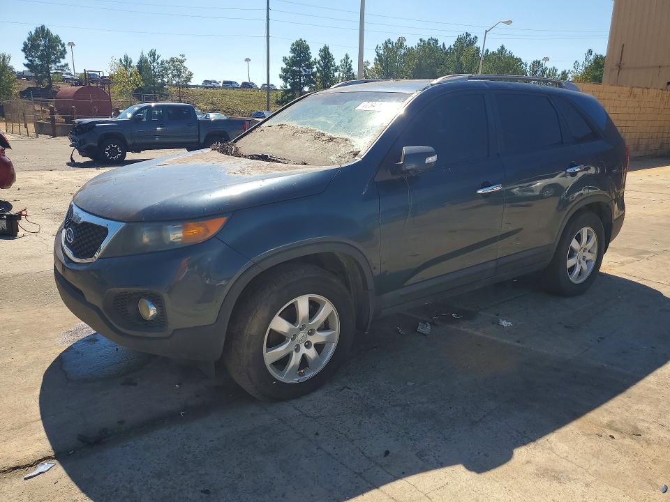 KIA SORENTO 2011 with VIN 5XYKT3A10BG023087 - Photo from auction