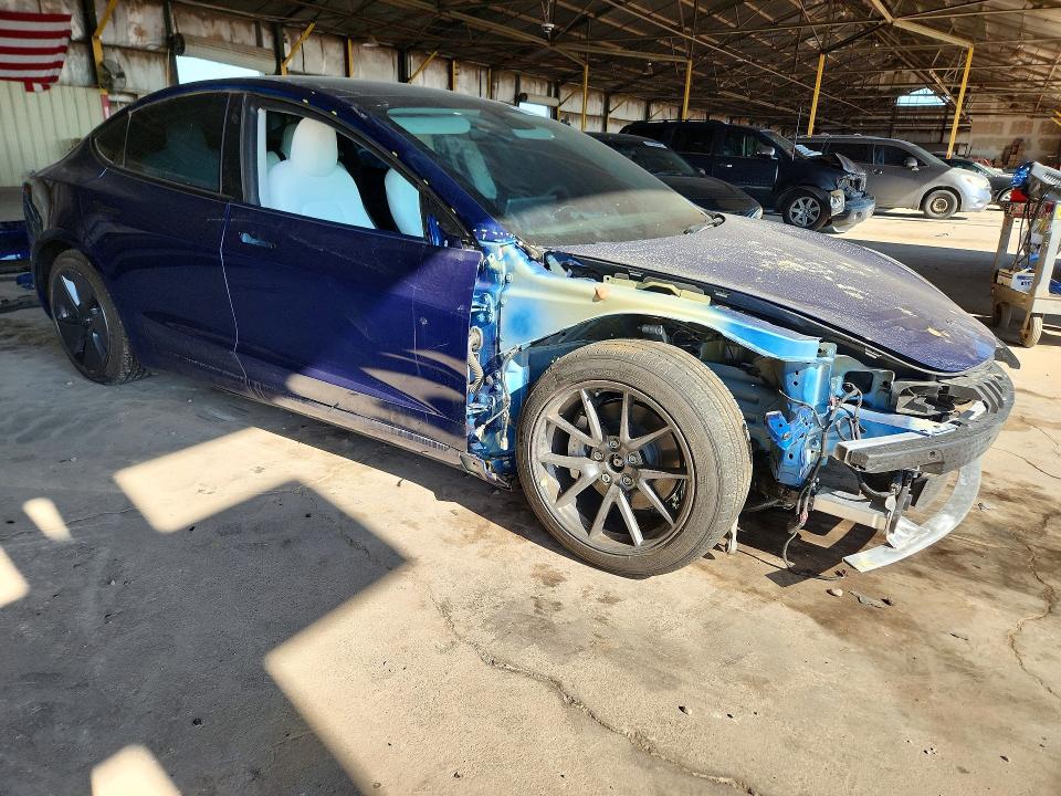Photo 4 from auction – 2022 TESLA MODEL 3 with VIN 5YJ3E1EB5NF109593