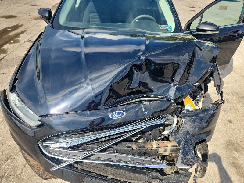 Photo 11 from auction – 2016 FORD FUSION with VIN 3FA6P0H79GR277219