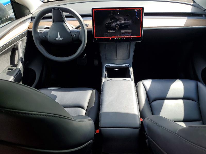 Photo 8 from auction – 2023 TESLA MODEL Y with VIN 7SAYGDED6PF960505