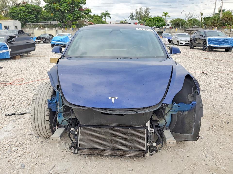 Снимка 5 от търг – 2018 TESLA MODEL 3 с VIN 5YJ3E1EA5JF032550