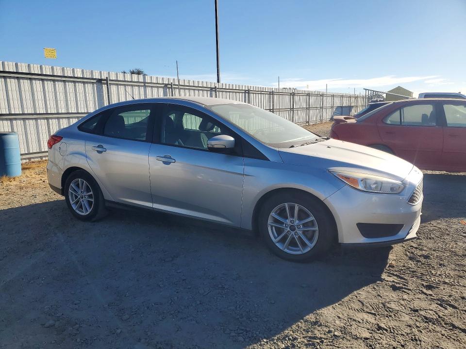 Фото 4 с аукциона – 2017 FORD FOCUS с VIN 1FADP3F27HL296433
