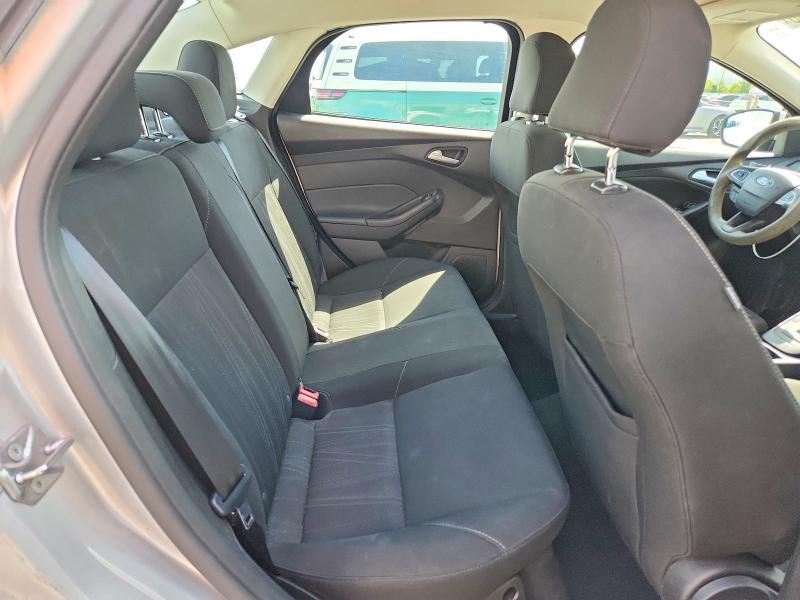 Foto 10 de la subasta – 2017 FORD FOCUS con VIN 1FADP3F21HL248247