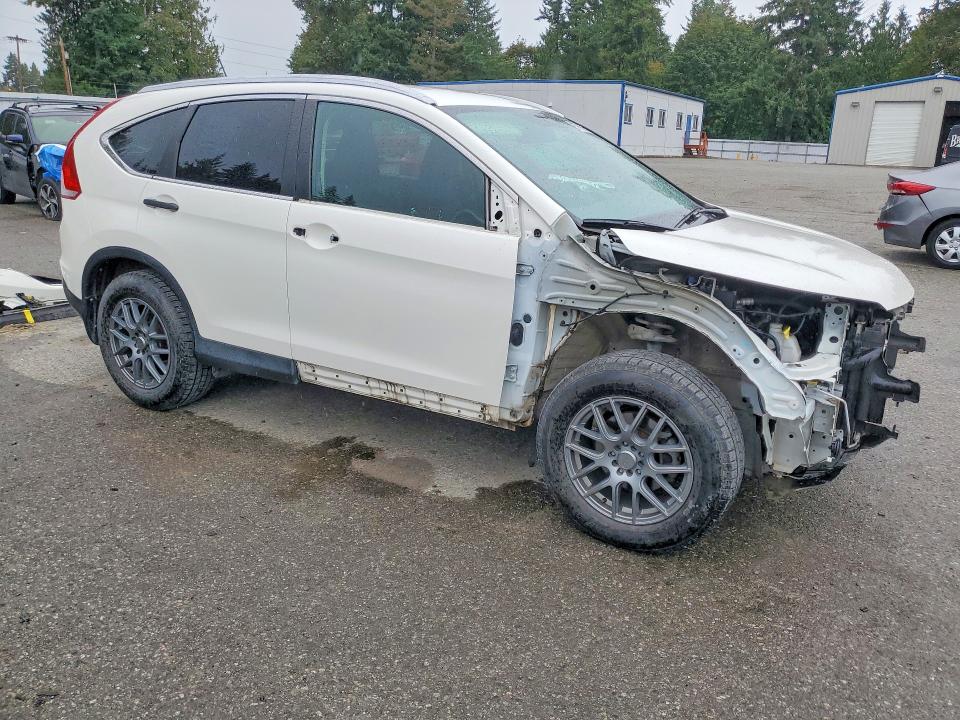 Photo 4 from auction – 2014 HONDA CR-V with VIN 2HKRM3H33EH003531