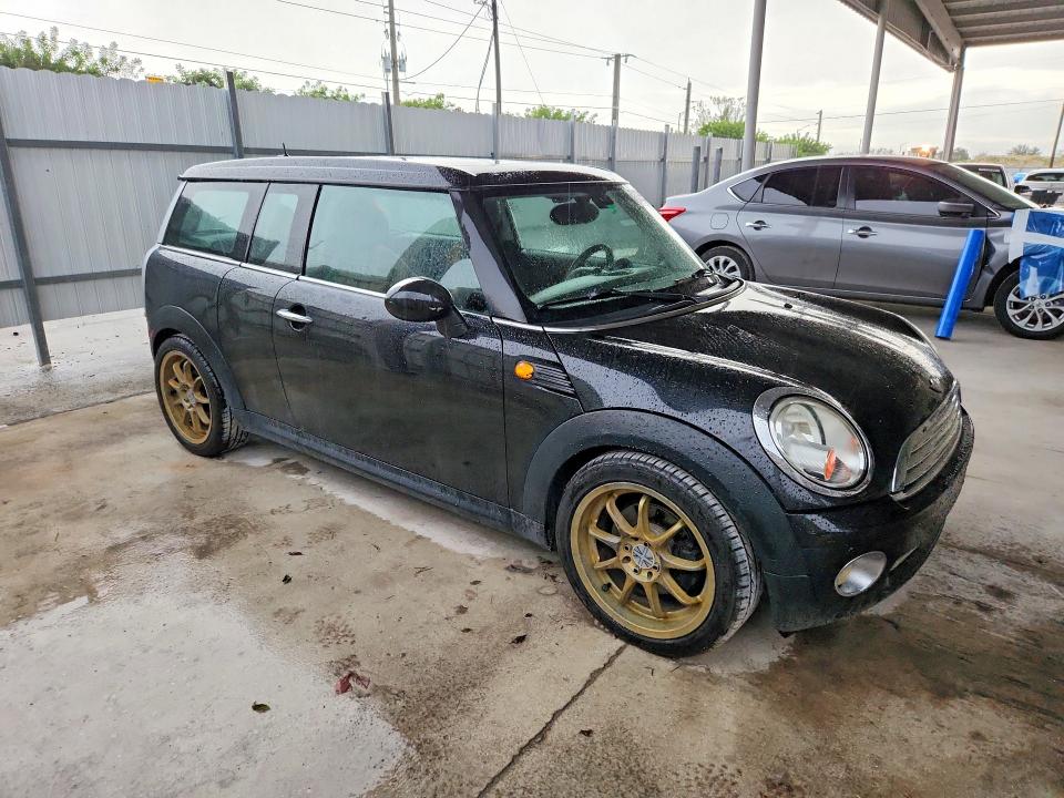 Фото 4 с аукциона – 2009 MINI COOPER с VIN WMWML33569TX34202