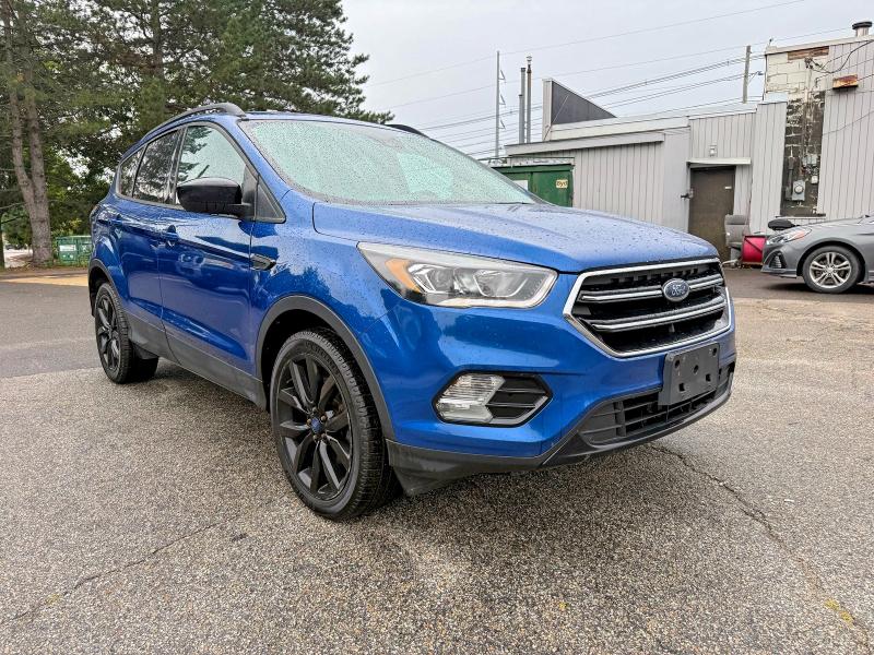 Photo 2 from auction – 2018 FORD ESCAPE with VIN 1FMCU9GD2JUA14650