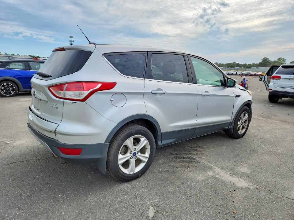 Photo 3 from auction – 2015 FORD ESCAPE with VIN 1FMCU9GX7FUA48374