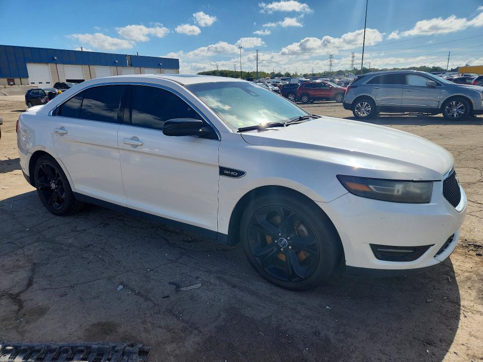 Снимка 4 от търг – 2015 FORD TAURUS с VIN 1FAHP2KT0FG172729