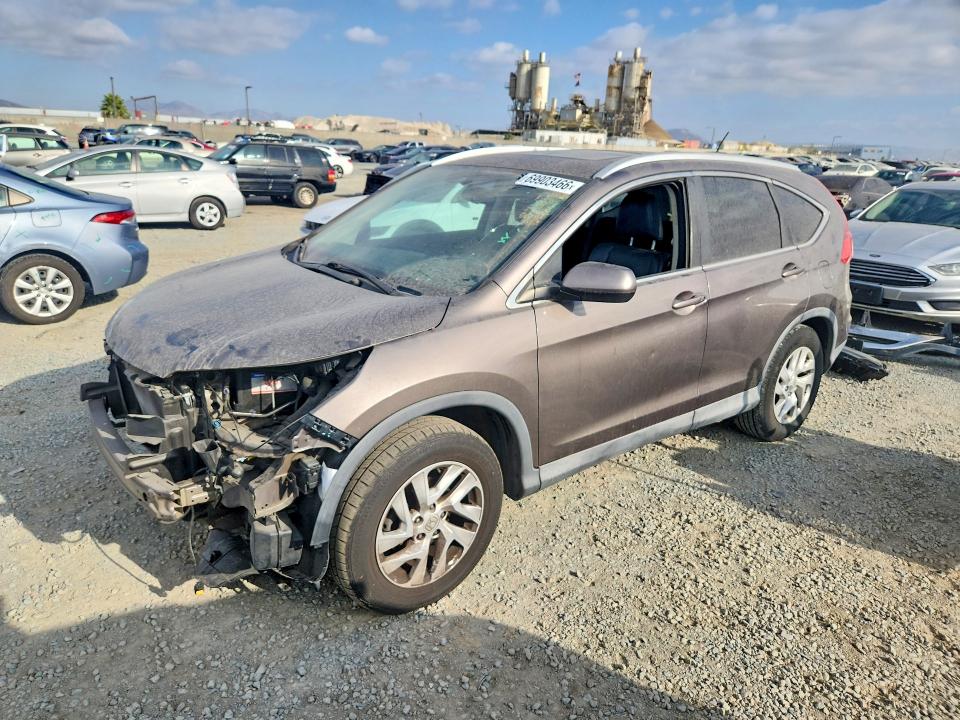 Photo 1 from auction – 2015 HONDA CR-V with VIN 2HKRM3H79FH557466