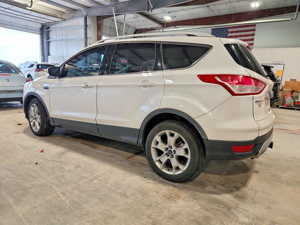 Снимка 2 от търг – 2014 FORD ESCAPE с VIN 1FMCU9J96EUE12499