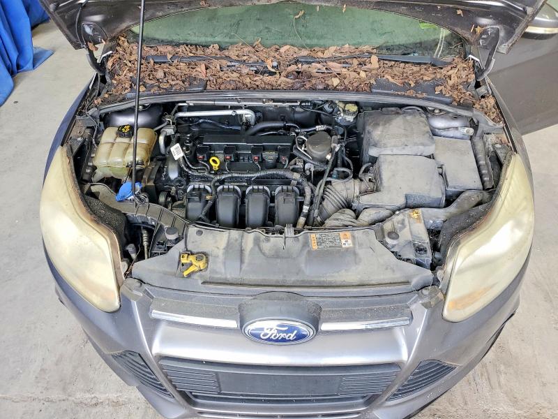 Снимка 11 от търг – 2014 FORD FOCUS с VIN 1FADP3F22EL286288