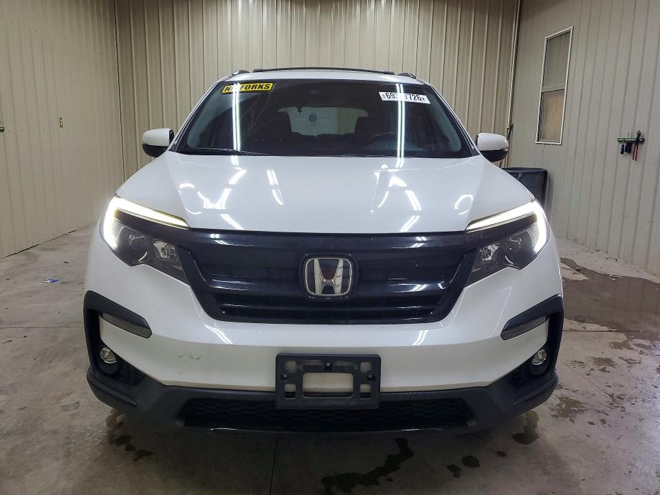 Photo 5 from auction – 2021 HONDA PILOT with VIN 5FNYF6H25MB068845