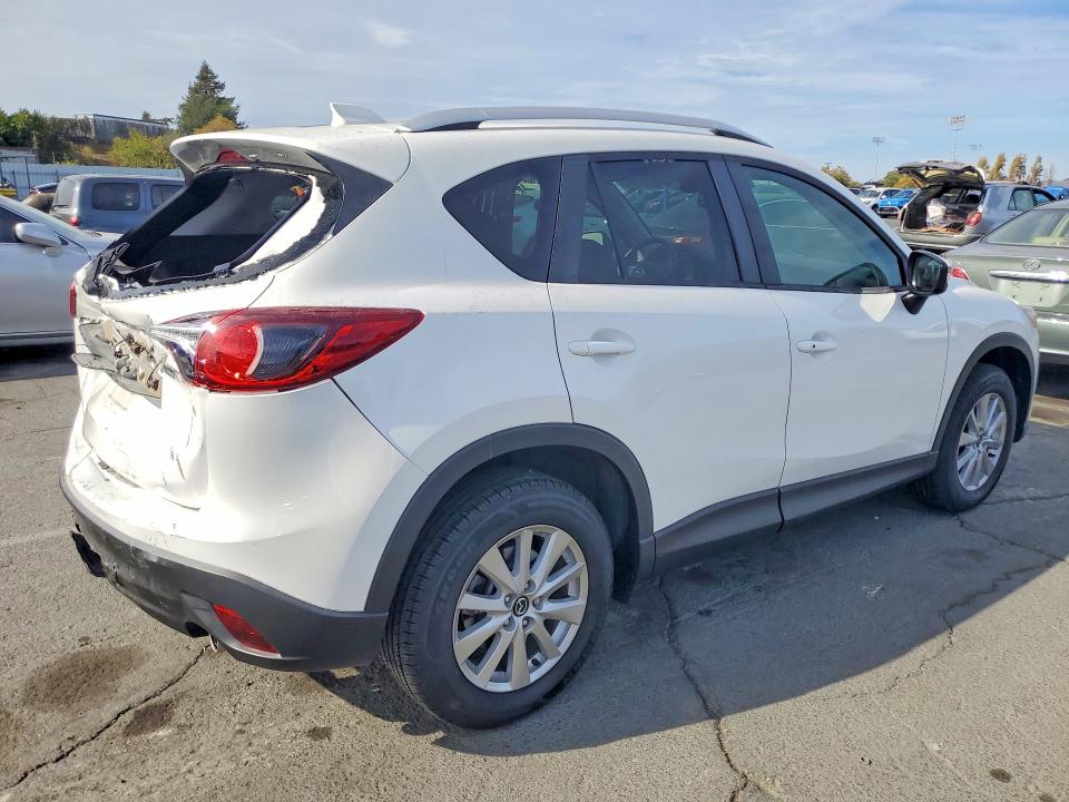 Photo 3 from auction – 2015 MAZDA CX-5 with VIN JM3KE2CY2F0545964