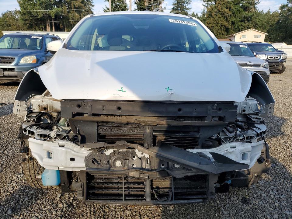 Photo 5 from auction – 2019 FORD ESCAPE with VIN 1FMCU9GD4KUB64163