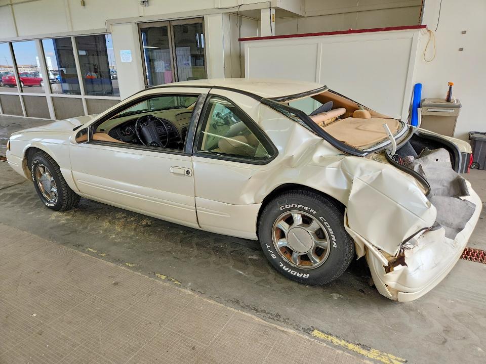 Фото 2 с аукциона – 1997 FORD THUNDERBIRD с VIN 1FALP62WXVH103339
