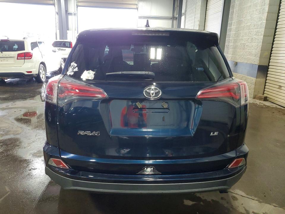 Photo 6 from auction – 2018 TOYOTA RAV4 with VIN JTMZFREV3JJ744184