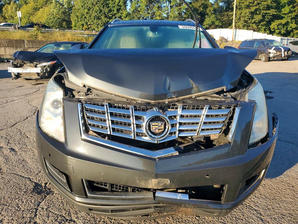Photo 5 from auction – 2014 CADILLAC SRX with VIN 3GYFNEE34ES611137