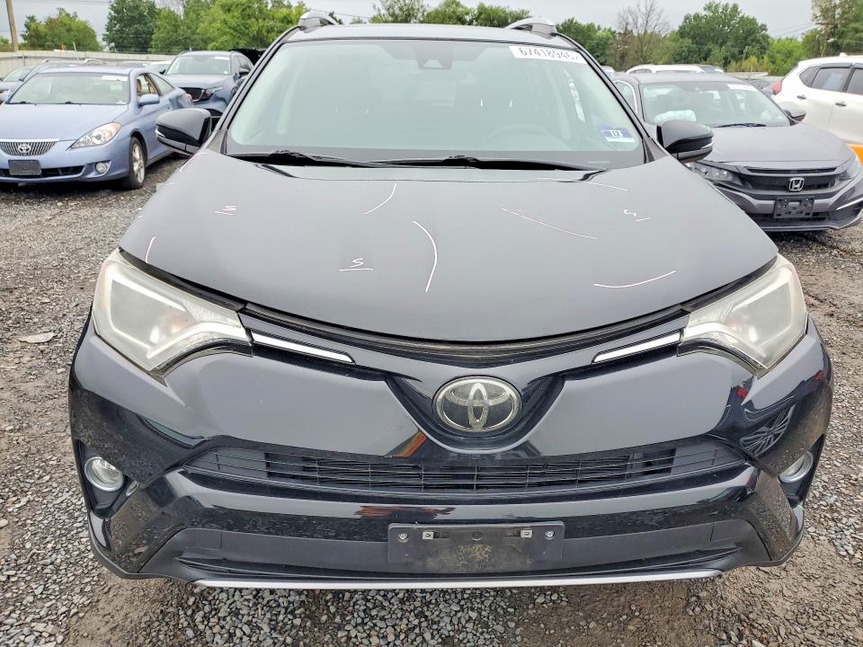 Photo 5 from auction – 2018 TOYOTA RAV4 with VIN 2T3RFREV5JW713651