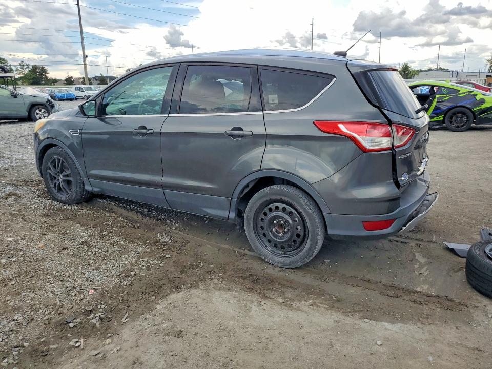 Photo 2 from auction – 2016 FORD ESCAPE with VIN 1FMCU0GX8GUB31065