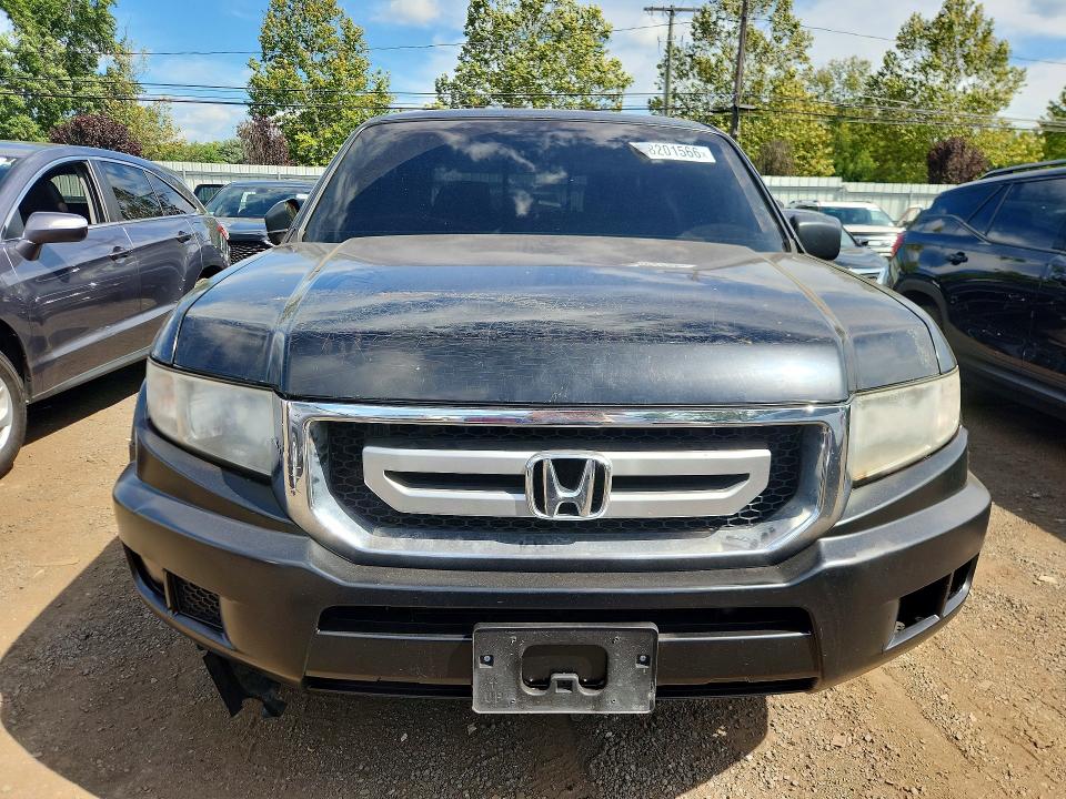Photo 5 from auction – 2010 HONDA RIDGELINE with VIN 5FPYK1F28AB005193