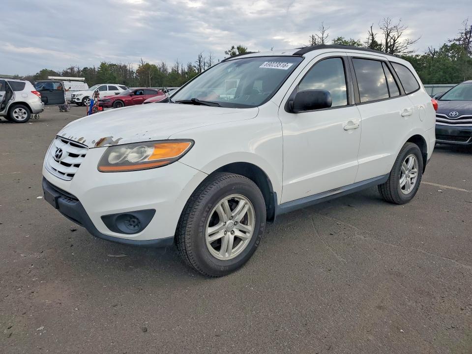 HYUNDAI SANTA FE 2010 z numerem VIN 5NMSG3AB5AH389774 - Zdjęcie z aukcji