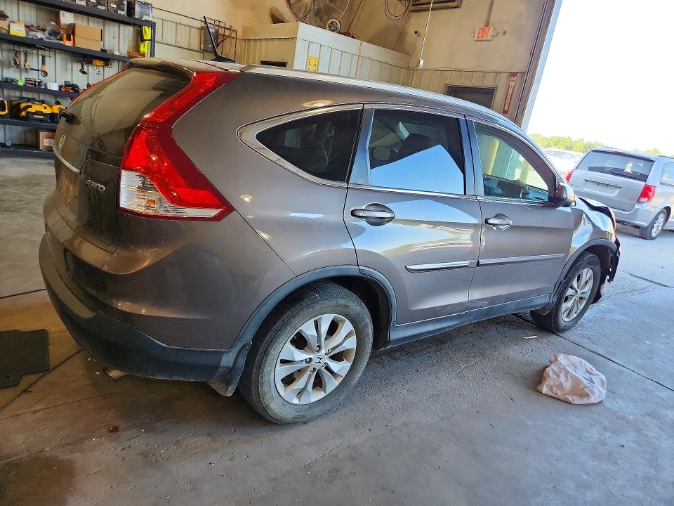 Photo 3 from auction – 2014 HONDA CR-V with VIN 2HKRM4H71EH621620
