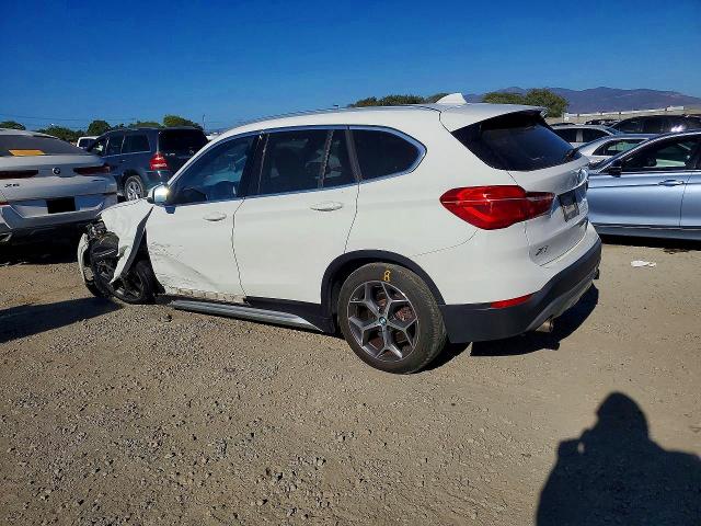 Photo 2 from auction – 2018 BMW X1 with VIN WBXHU7C34J3H43479