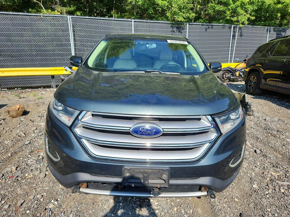 Photo 5 from auction – 2015 FORD EDGE with VIN 2FMTK3J84FBB19833