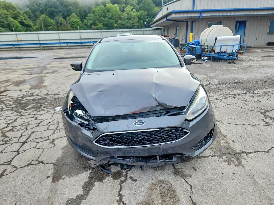 Photo 5 from auction – 2016 FORD FOCUS with VIN 1FADP3F22GL211447