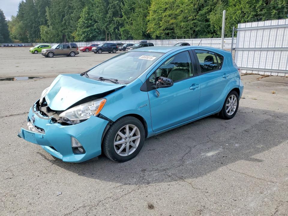 TOYOTA PRIUS C 2012 with VIN JTDKDTB34C1014357 - Photo from auction