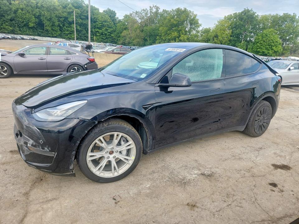 TESLA MODEL Y 2022 with VIN 7SAYGDEE0NA014287 - Photo from auction